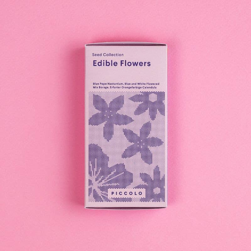 multiple packets of seeds on a colorful background with flowers