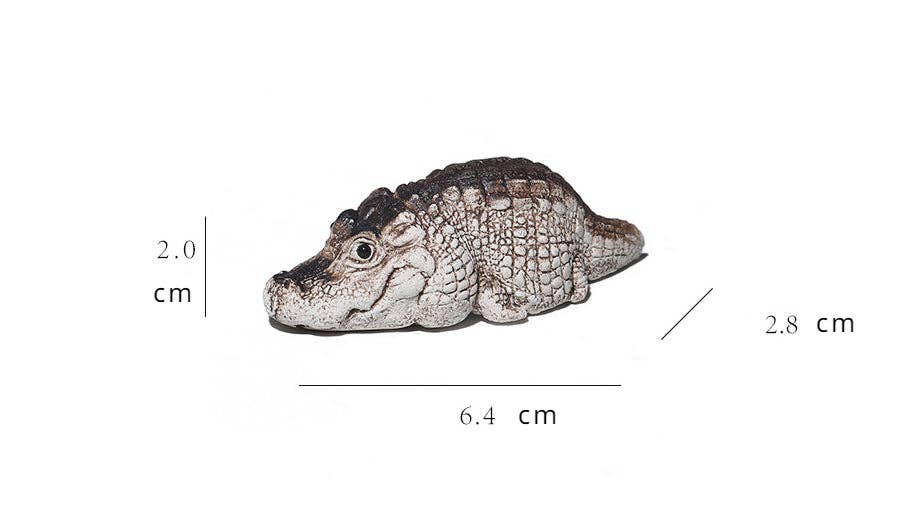 Teelemmikki - lepäävä  krokotiili